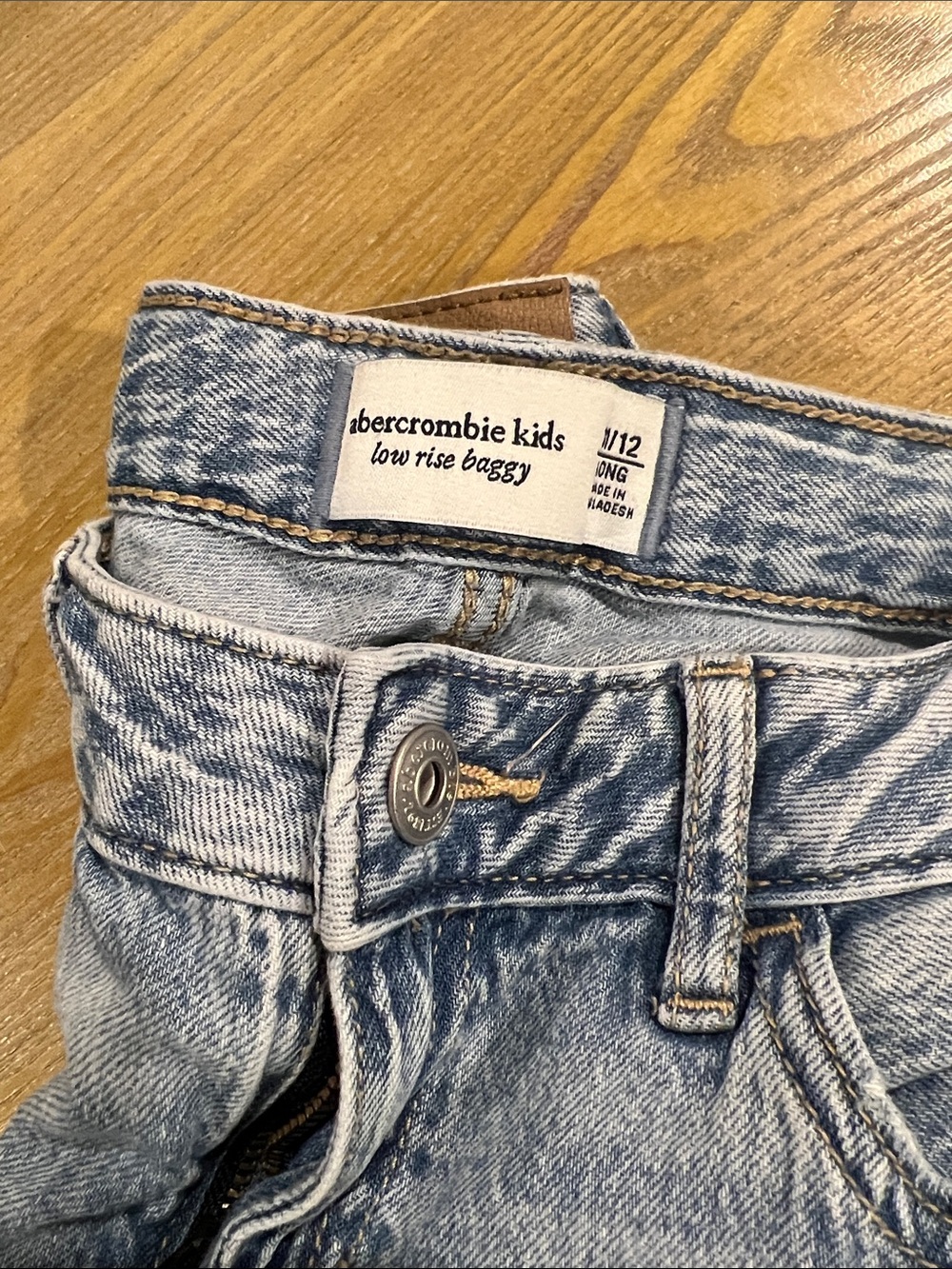 abercrombie kids light blue acid-wash low rise jeans